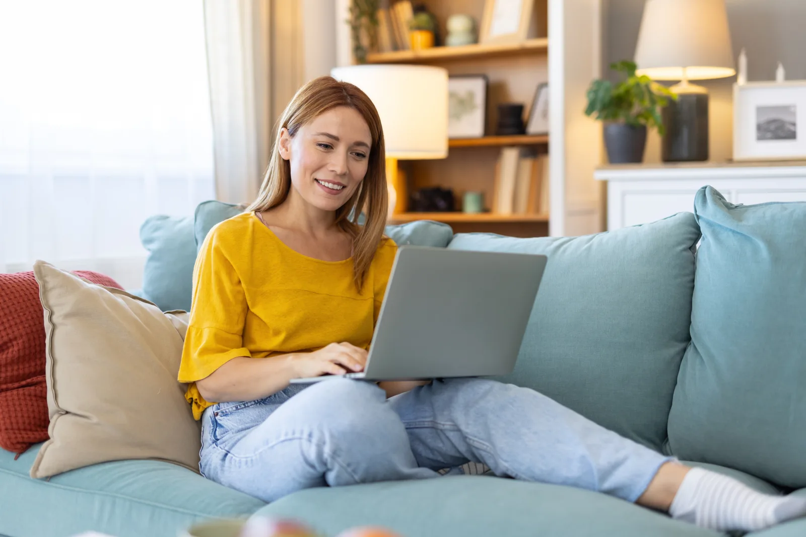 Person reviewing private insurance benefits paperwork for an ADHD assessment at a desk