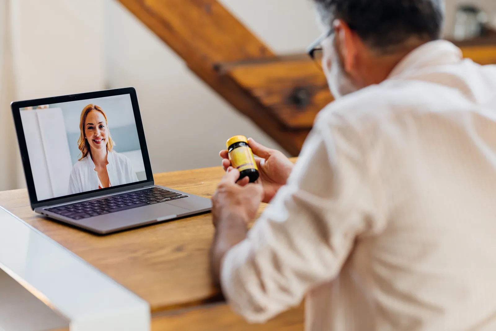 Clinician discussing ADHD medication and treatment options with a patient during a video appointment