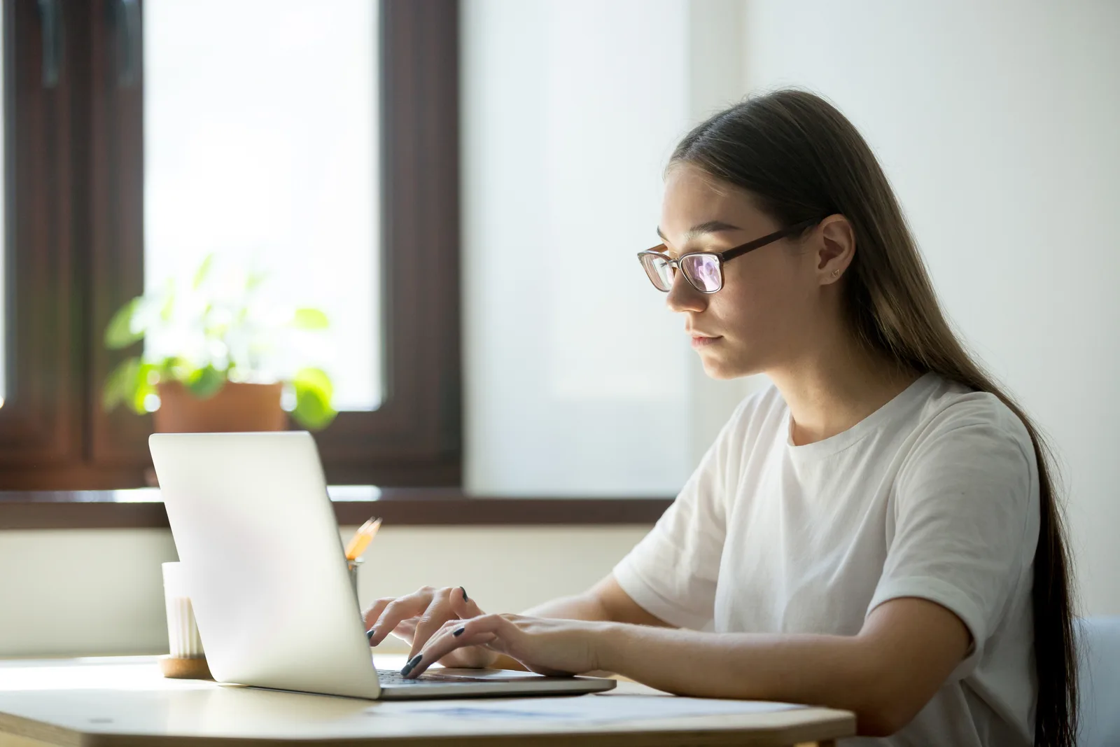 Person completing an online ADHD assessment questionnaire on a tablet at home