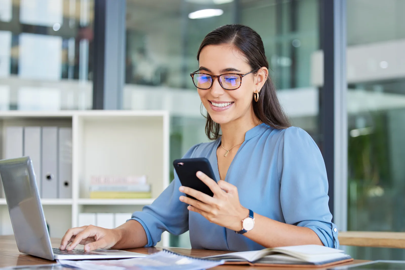 Smiling adult checking a calendar on a laptop after quickly booking an online ADHD assessment