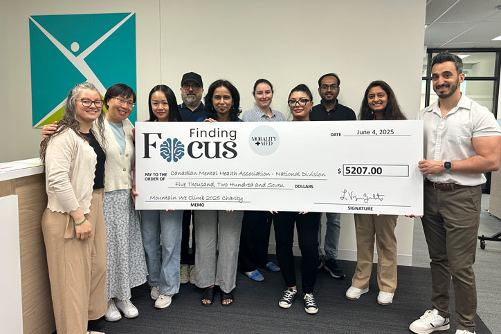 Finding Focus presenting the Mountains We Climb 2025 charity cheque to CMHA in Toronto