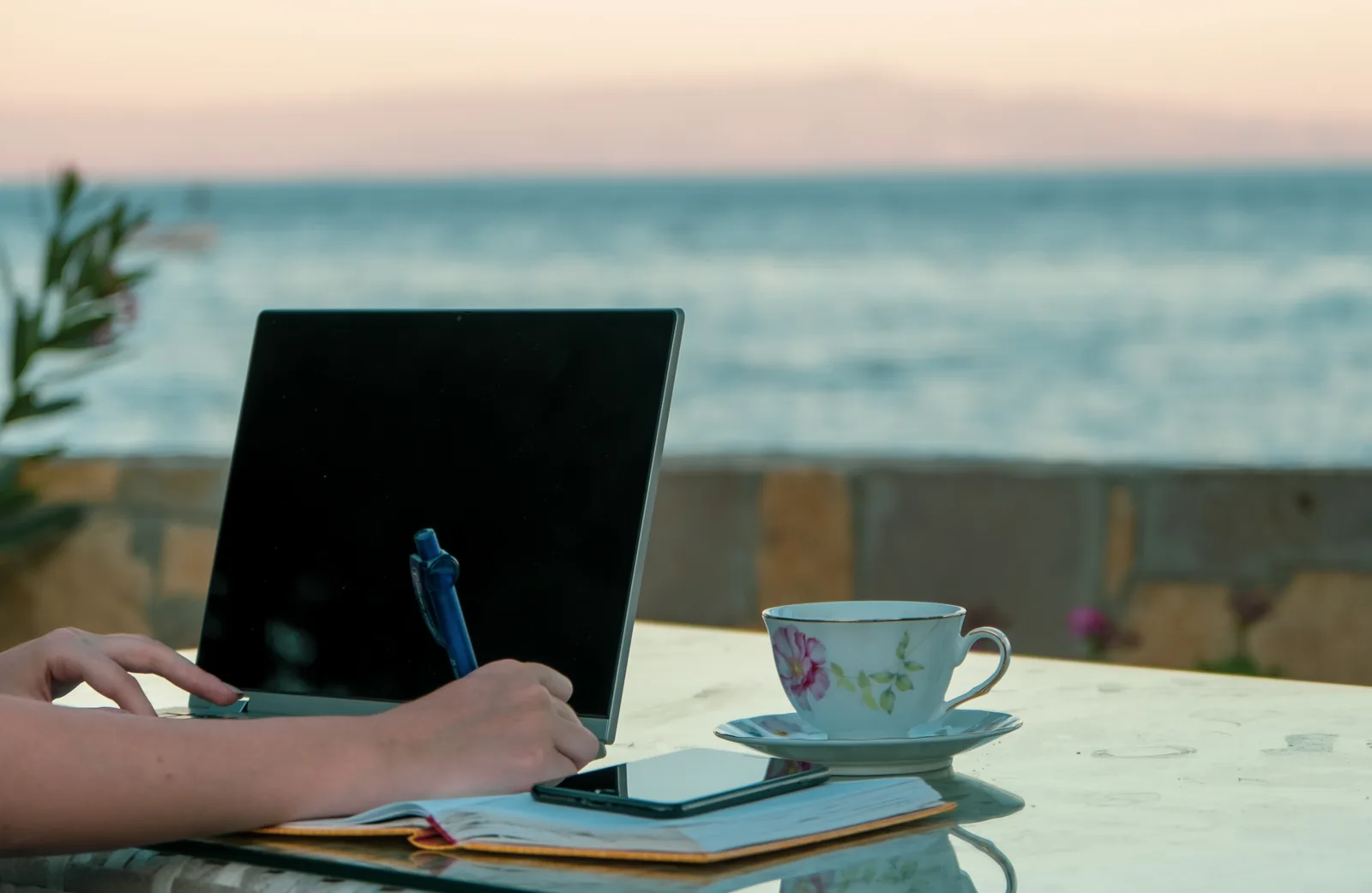An adult in a coastal Nova Scotia home takes part in an online ADHD assessment by a bright window