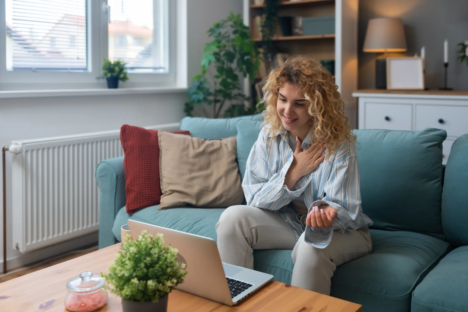 Adult talking with a licensed clinician during an online video ADHD assessment at home